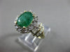 ESTATE 1.82CT ROUND & BAGUETTE DIAMOND & AAA EMERALD 14K TWO TONE GOLD HALO RING