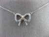 ESTATE .07CT ROUND DIAMOND 14KT WHITE & YELLOW GOLD 3D OPEN CLASSIC BOW NECKLACE