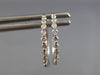 ESTATE .17CT DIAMOND 14KT WHITE GOLD 3D CLASSIC SHARE PRONG HUGGIE HOOP EARRINGS