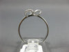 ESTATE .12CT DIAMOND 14KT WHITE GOLD 3D FLOWER LOVE KNOT FUN FRIENDSHIP RING