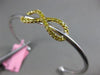 ESTATE .73CT WHITE & FANCY YELLOW DIAMOND 18KT 2 TONE GOLD INFINITY LOVE BANGLE