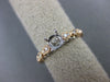 ESTATE .20CT DIAMOND 14KT WHITE & ROSE GOLD OPEN FILIGREE FLOWER ENGAGEMENT RING