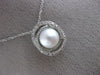 ESTATE .18CT DIAMOND & AAA SOUTH SEA PEARL 14KT WHITE GOLD 3D LOVE KNOT PENDANT