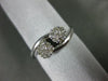 ESTATE .25CT DIAMOND 14KT WHITE GOLD DOUBLE FLOWER CLUSTER CRISS CROSS LOVE RING