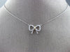 ESTATE .07CT ROUND DIAMOND 14KT WHITE & YELLOW GOLD 3D OPEN CLASSIC BOW NECKLACE