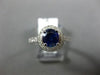 ESTATE 1.75CT DIAMOND & AAA SAPPHIRE 18KT WHITE GOLD ROUND HALO ENGAGEMENT RING