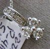 ESTATE .22CT DIAMOND 14KT WHITE GOLD ELONGATED 3 STONE FLOWER FLOATING PENDANT