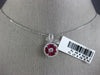 ESTATE .94CT ROUND DIAMOND & AAA RUBY 18KT WHITE GOLD CIRCULAR FLOATING PENDANT