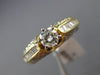 ESTATE 1.20CT ROUND & BAGUETTE DIAMOND 14KT YELLOW GOLD CLASSIC ENGAGEMENT RING