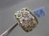 ESTATE LARGE 2.12CTW FANCY YELLOW & WHITE DIAMOND 18KT YELLOW GOLD FLOWER RING