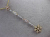 ANTIQUE LONG .19CT DIAMOND BY THE YARD 14KT TRI COLOR GOLD SNOWFLAKE PENDANT