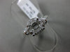 ESTATE .64CT DIAMOND 18KT WHITE GOLD 3D FOUR PRONG 3 STONE HALO ENGAGEMENT RING