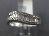 ESTATE .32CT ROUND & BAGUETTE DIAMOND 14K WHITE GOLD SWIRL WAVE ANNIVERSARY RING