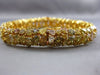 ESTATE WIDE 25.30CT WHITE FANCY NATURAL YELLOW DIAMOND 18K GOLD TENNIS BRACELET