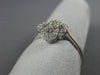 ESTATE SMALL .16CT ROUND DIAMOND 14KT WHITE GOLD OPEN FLOWER 4 LEAF CLOVER RING