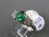 ESTATE 1.02CT DIAMOND & AAA EMERALD 18KT WHITE GOLD BUTTERFLY ENGAGEMENT RING