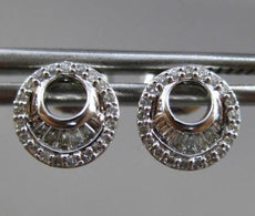 ESTATE .21CT BAGUTTE & ROUND DIAMOND 14K WHITE GOLD OPEN SEA SHELL POST EARRINGS