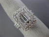 EXTRA LARGE 1.60CT ROUND & BAGUETTE DIAMOND 18KT WHITE GOLD HALO ENGAGEMENT RING