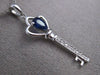 ESTATE .45CT DIAMOND & SAPPHIRE 14KT WHITE GOLD KEY TO MY HEART FLOATING PENDANT