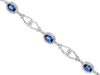 ESTATE 4.44CT DIAMOND & AAA TANZANITE 14KT WHITE GOLD LOVE KNOT TENNIS BRACELET