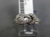 ESTATE .25CT DIAMOND 14KT WHITE GOLD 3D FILIGREE LOVE KNOT BELT SOLITAIRE RING