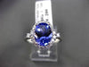 ESTATE 1.95CT DIAMOND & TANZANITE 18KT WHITE GOLD 3D OVAL HALO ENGAGEMENT RING