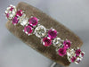 ESTATE LARGE 10.50CT DIAMOND & AAA RUBY PLATINUM 3D JOURNEY LOVE TENNIS BRACELET