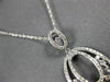 ESTATE .64CT ROUND & BAGUETTE DIAMOND 14KT WHITE GOLD 3D OPEN FILIGREE PENDANT