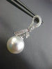 ESTATE .23CT DIAMOND & AAA SOUTH SEA PEARL 18KT WHITE GOLD BOW HANGING EARRINGS