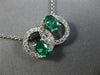 ESTATE 1.03CT DIAMOND & AAA EMERALD 14KT WHITE GOLD OVAL CIRCLE OF LIFE PENDANT