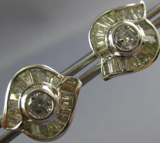 ESTATE .88CT WHITE & FANCY YELLOW DIAMOND 18KT WHITE GOLD EVIL EYE STUD EARRINGS