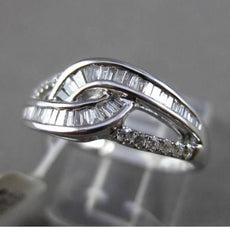 ESTATE WIDE .34CT BAGUETTE & ROUND DIAMOND 18KT WHITE GOLD 3D INFINITY LOVE RING