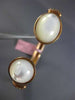 ESTATE .10CT DIAMOND & AAA MOON STONE 14KT ROSE GOLD TWO STONE BANGLE BRACELET