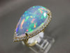 ESTATE EXTRA LARGE 8.13CT DIAMOND & AAA OPAL 14KT YELLOW GOLD CLASSIC HALO RING