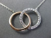 ESTATE .30CT DIAMOND 14KT WHITE & ROSE GOLD 3D CLASSIC CIRCLE LOVE KNOT NECKLACE