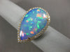 ESTATE EXTRA LARGE 8.13CT DIAMOND & AAA OPAL 14KT YELLOW GOLD CLASSIC HALO RING