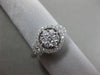 ESTATE WIDE .69CT DIAMOND 18KT WHITE GOLD 3D HALO CLUSTER FRIENDSHIP LOVE RING