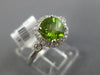 ESTATE 1.51CT DIAMOND & PERIDOT 14KT WHITE GOLD 3D ROUND HALO FRIEDNSHIP RING