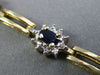 ESTATE WIDE 2.90CT DIAMOND & AAA SAPPHIRE 14KT TWO TONE GOLD OVAL HALO BRACELET