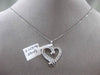 ESTATE .29CT ROUND & BAGUETTE DIAMOND 14K WHITE GOLD FLOATING LOVE HEART PENDANT