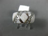 ESTATE LARGE .57CT ROUND DIAMOND & MOTHER OF PEARL 14KT WHITE GOLD CHANNEL RING