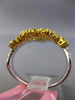 LARGE 1.33CT WHITE & FANCY YELLOW DIAMOND 18KT WHITE & YELLOW GOLD V SHAPE RING