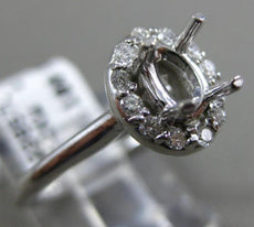 ESTATE .16CT DIAMOND 14KT WHITE GOLD OVAL FOUR PRONG SEMI MOUNT ENGAGEMENT RING