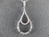 ESTATE .46CT ROUND & BAGUETTE DIAMOND 14KT WHITE GOLD TEAR DROP FLOATING PENDANT