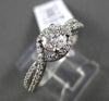 ESTATE .79CT ROUND DIAMOND 14KT WHITE GOLD SOLITARE INFINITY ENGAGEMENT RING