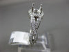 ESTATE .38CT DIAMOND 14KT WHITE GOLD HALO INFINITY SEMI MOUNT ENGAGEMENT RING