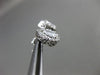 ESTATE .85CT DIAMOND 14KT WHITE GOLD 3D PEAR SHAPE CLASSIC HALO STUD EARRINGS