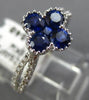 ESTATE 1.23CT DIAMOND & SAPPHIRE 18KT WHITE GOLD FILIGREE INVISIBLE FLOWER RING