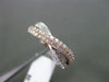 ESTATE 1.08CT DIAMOND 14KT WHITE & ROSE GOLD SEMI ETERNITY X INFINITY LOVE RING