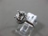 ESTATE .16CT DIAMOND 14KT WHITE GOLD OVAL FOUR PRONG SEMI MOUNT ENGAGEMENT RING